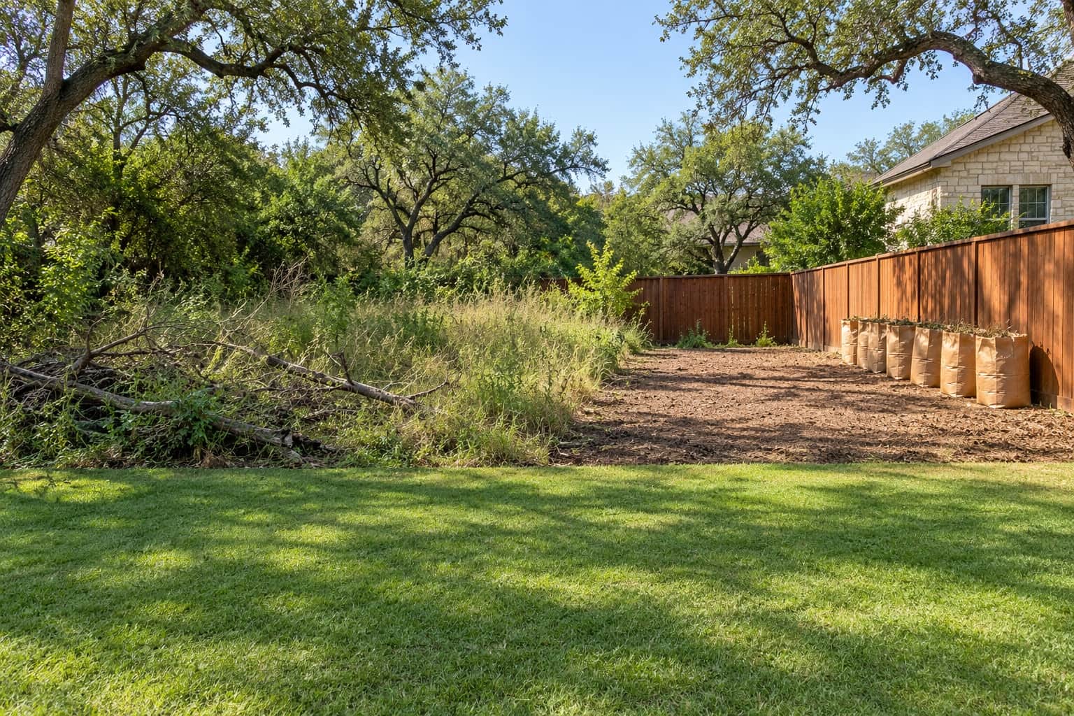 Yard after leaves, brush and landscape debris were gathered