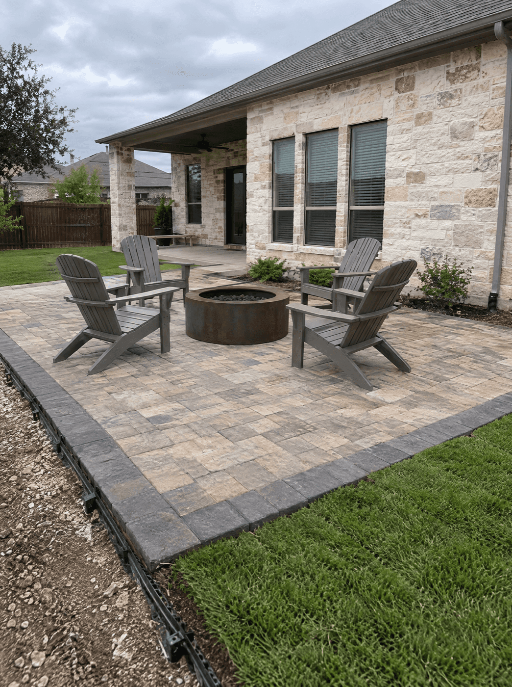Backyard paver patio hardscape installed in San Antonio, Texas by Klema Builders