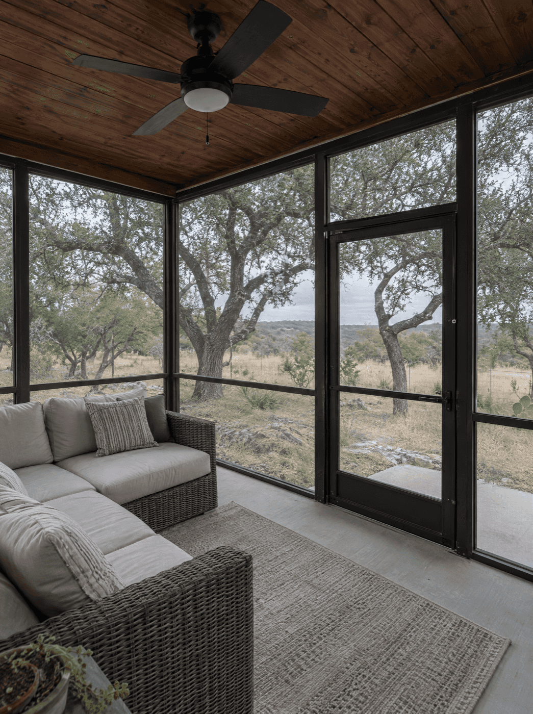 Screened-in porch enclosure for outdoor living in San Antonio, Texas by Klema Builders