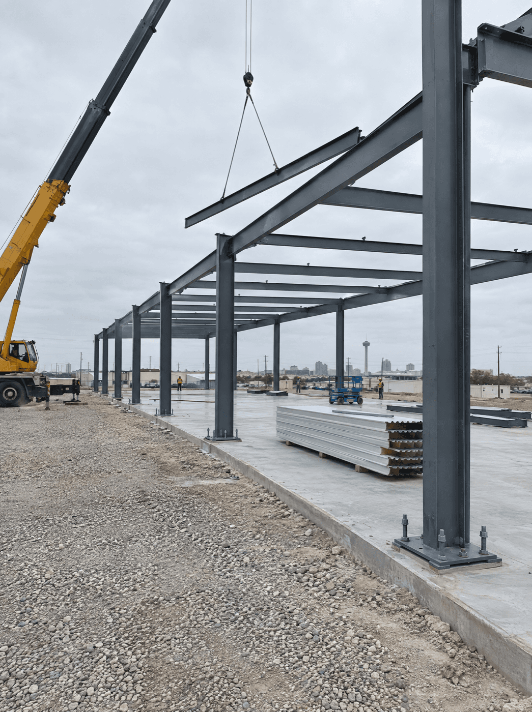 Structural steel warehouse frame being erected near San Antonio, Texas by Klema Builders
